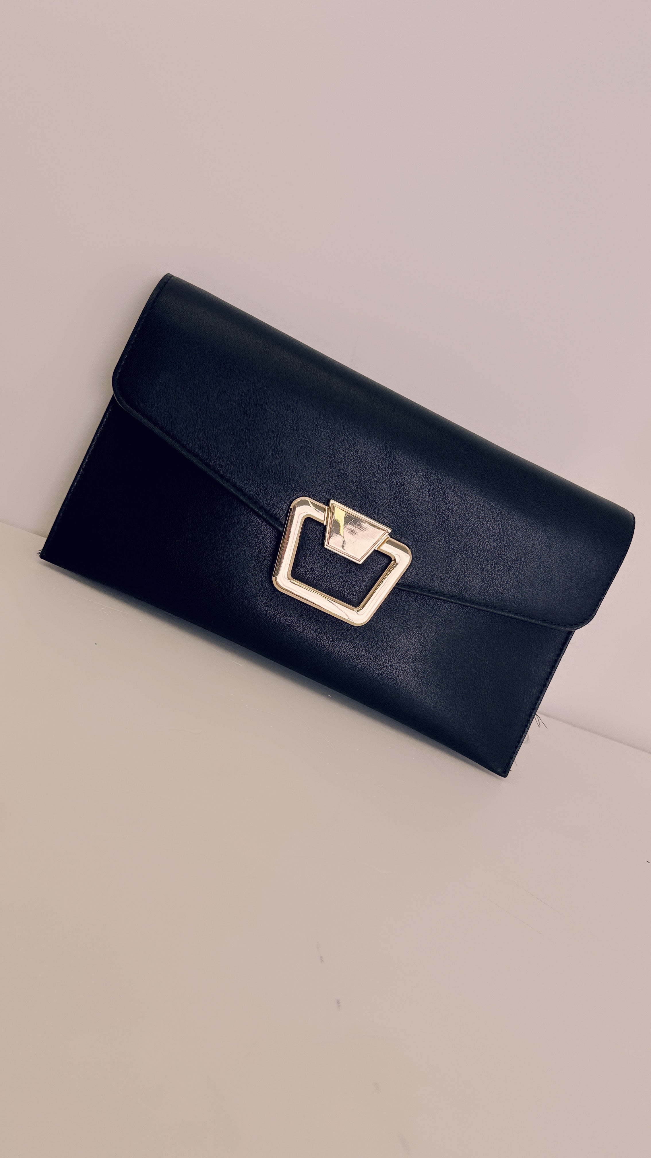 Clutch nera e oro