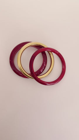 Set bracciali oro e bordeaux